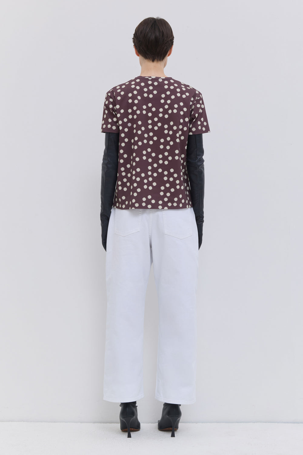 Luxury optical white cropped wide-leg denim pants by Christian Wijnants.