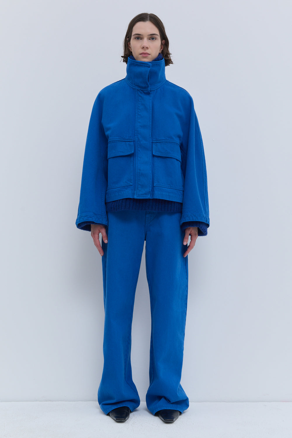 Klein blue denim jacket with large flap pockets