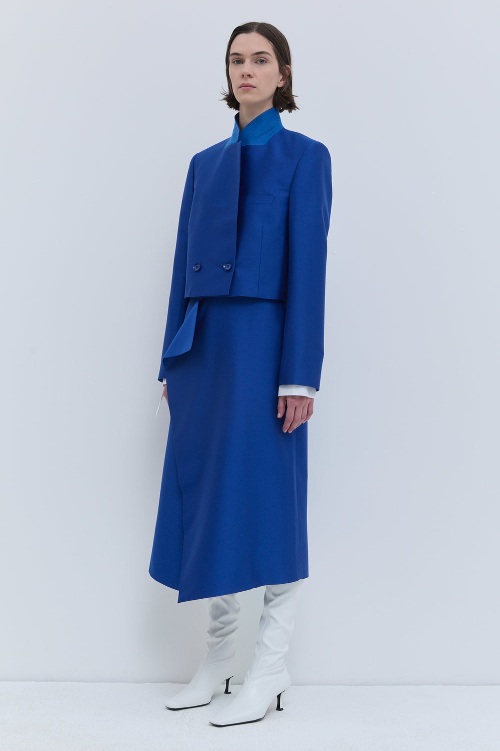 Deep blue cropped jacket back view