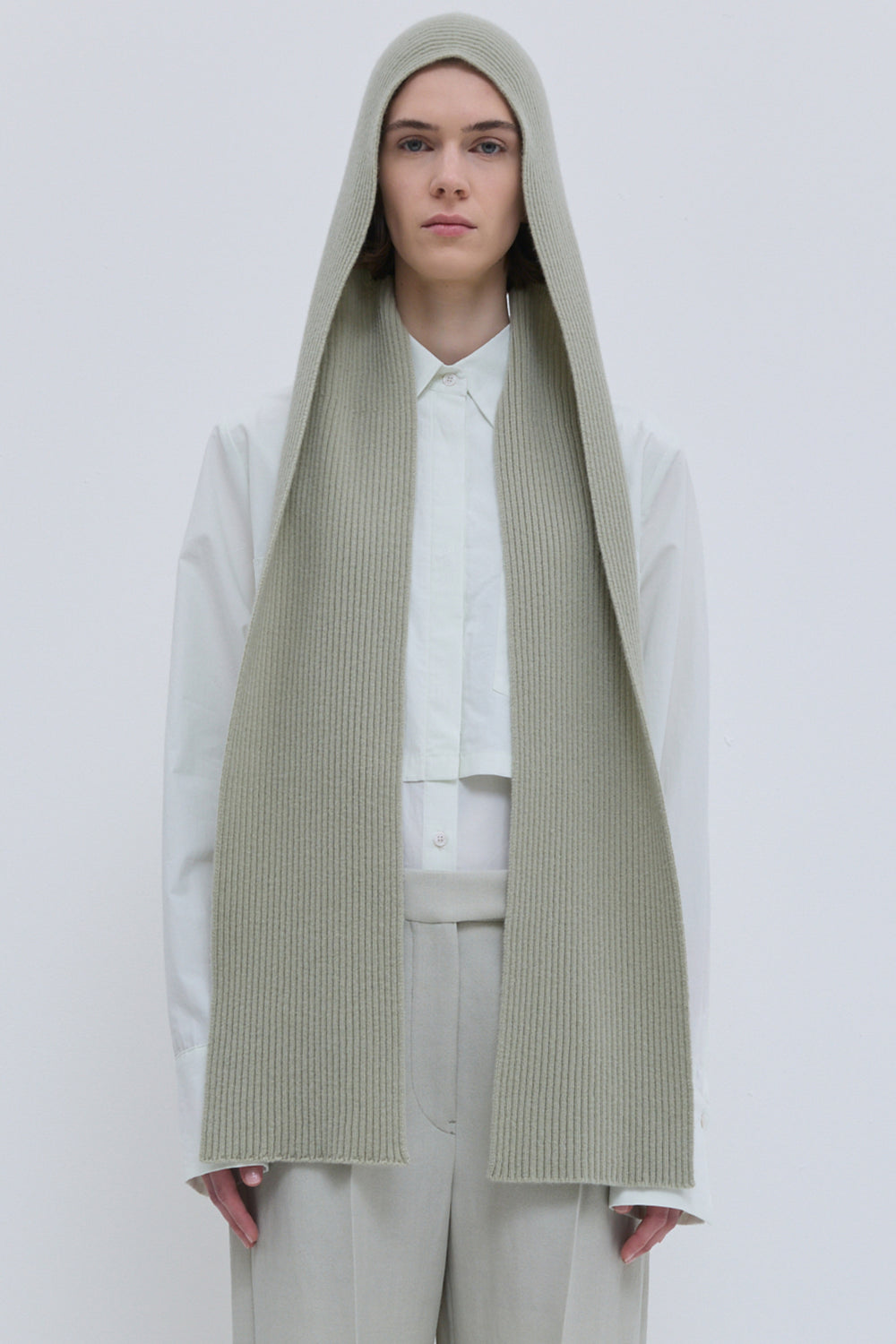 Light sage superfine wool hooded scarf with elongated scarf design