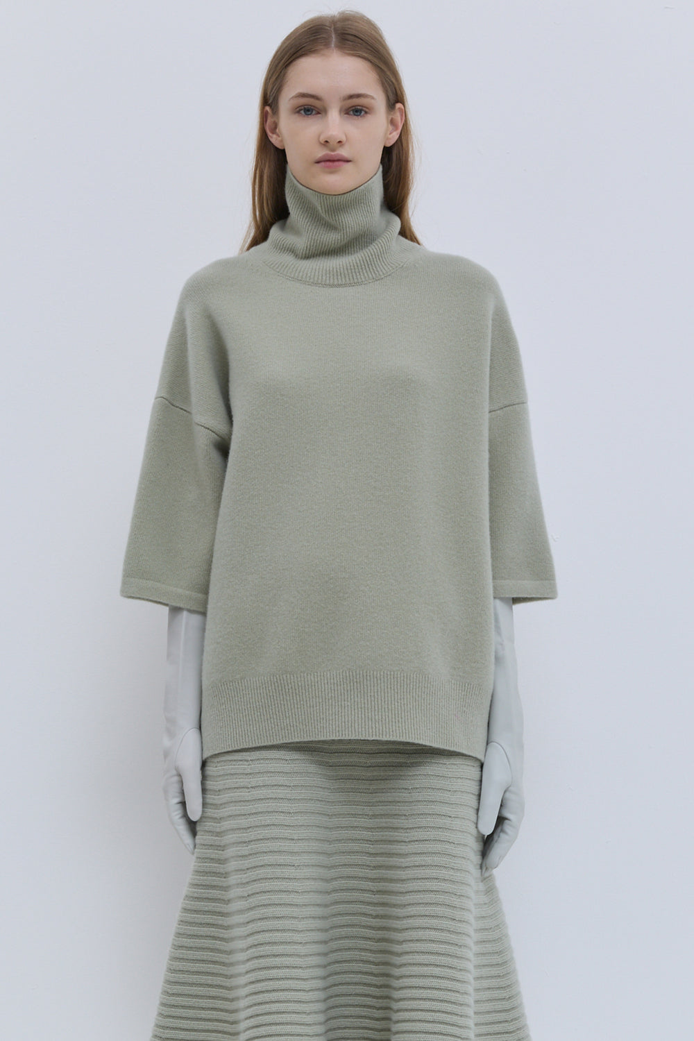 Light sage short-sleeve turtleneck knit top front view
