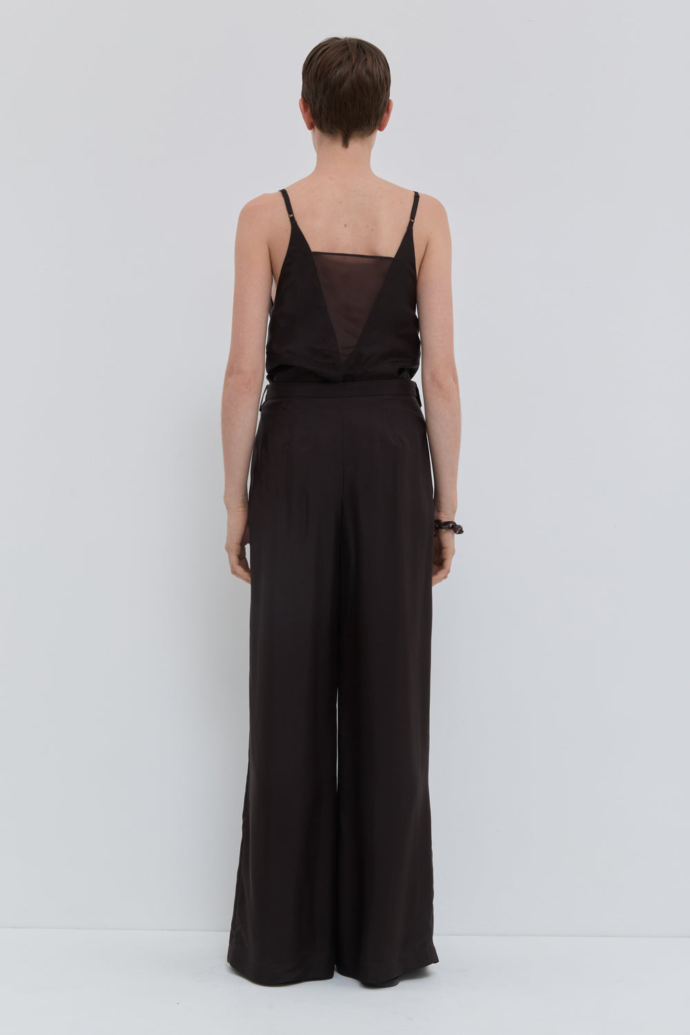 Chocolate wide leg trousers with draped front panels and belt back