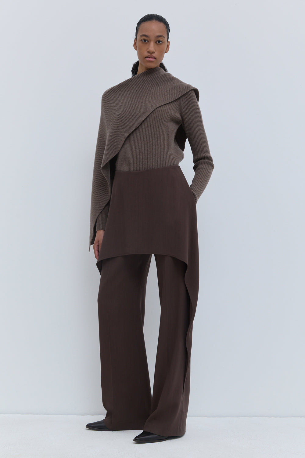 Christian Wijnants chestnut conceptual trousers in 100% virgin wool with an asymmetrical layered skirt panel