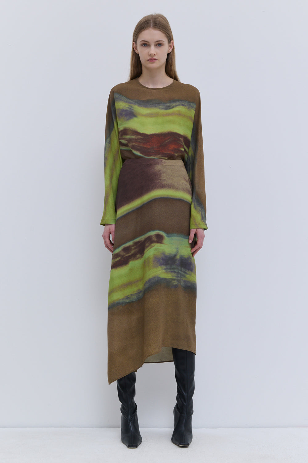 Christian Wijnants Sueza fluid silk skirt with fitted waist and asymmetric hem.