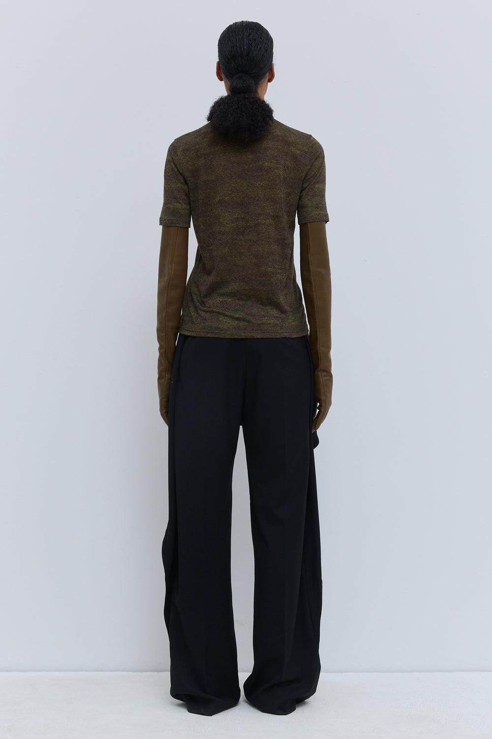 Back view of the Tampi short-sleeve crewneck top in textured wool jersey.
