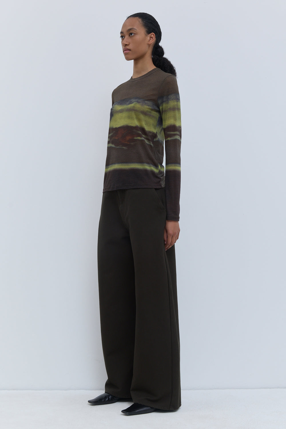 Side view of Tampione fitted long-sleeve crewneck top in Aurora Earth print.