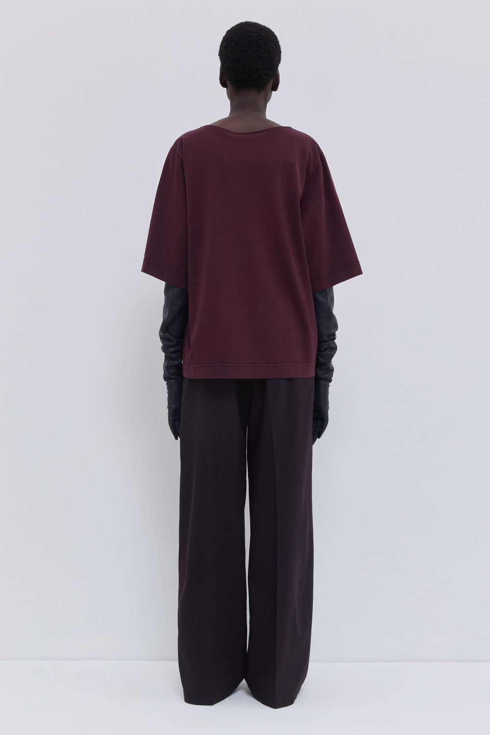 Side view of oversized V-neck jersey T-shirt