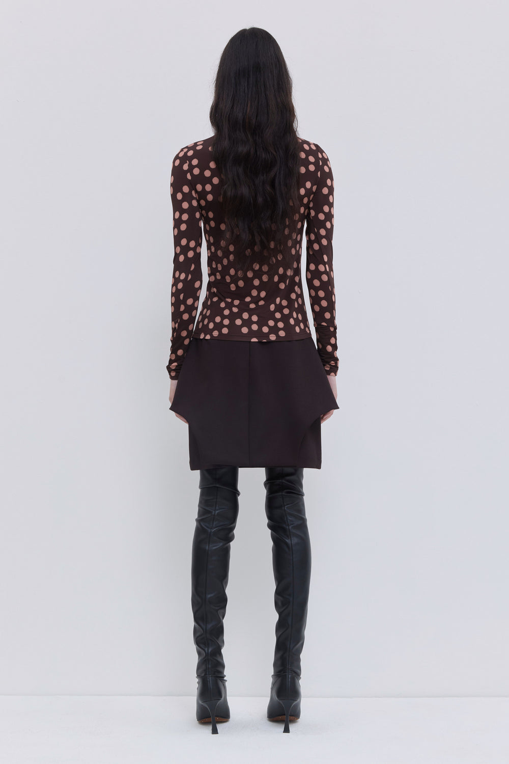 Back view of stretch jersey turtleneck with dot print
