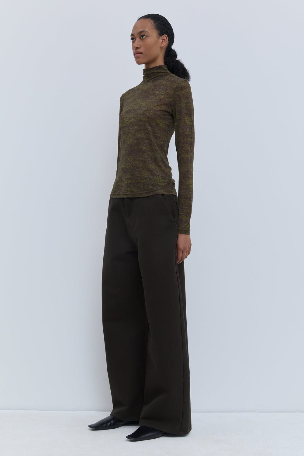 Christian Wijnants Tugal printed turtleneck top in night forest storm, close fitting long sleeve jersey top styled with wide leg trousers