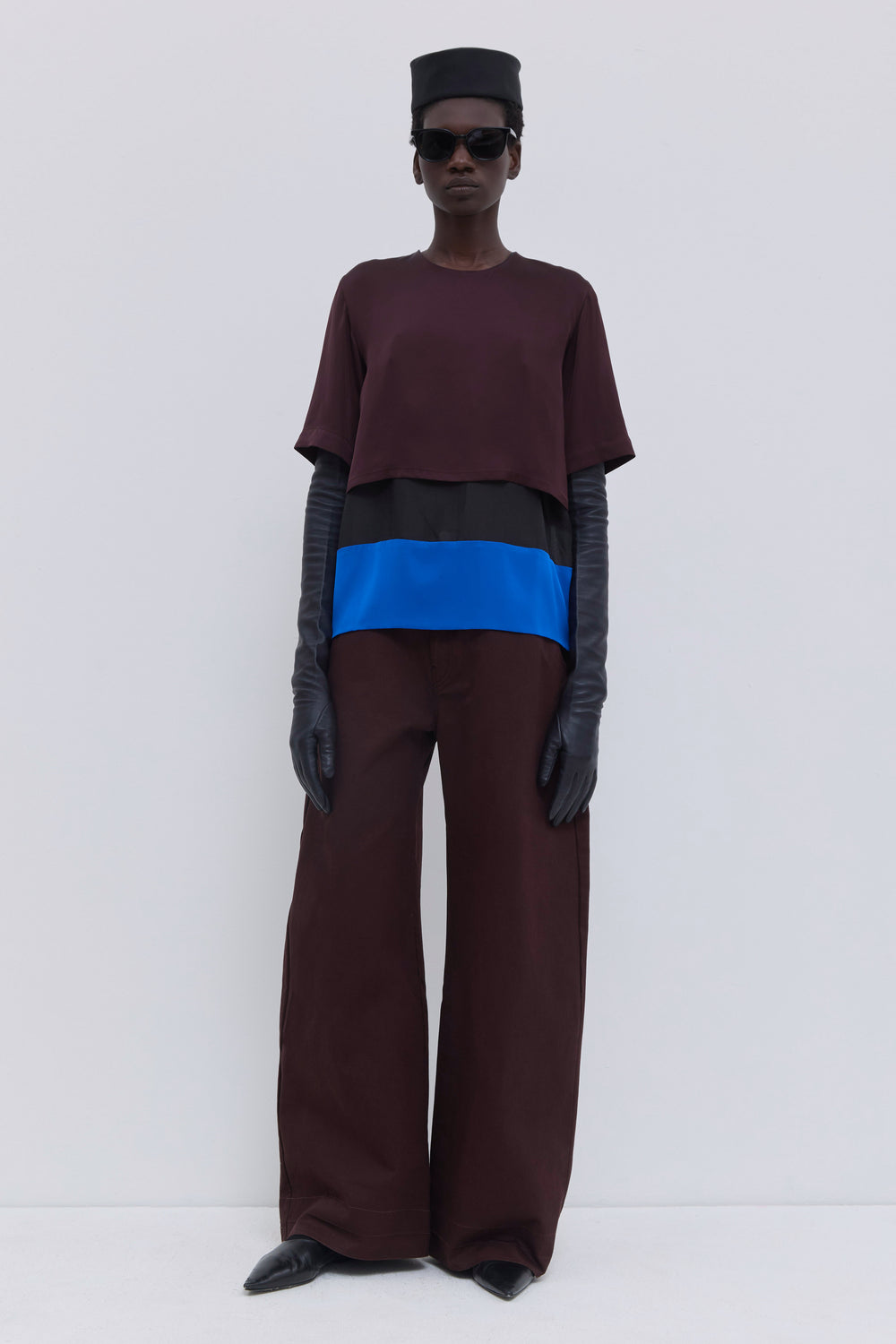 Christian Wijnants Tuno colourblock silk top in plum and cobalt, featuring short sleeves and a layered design.