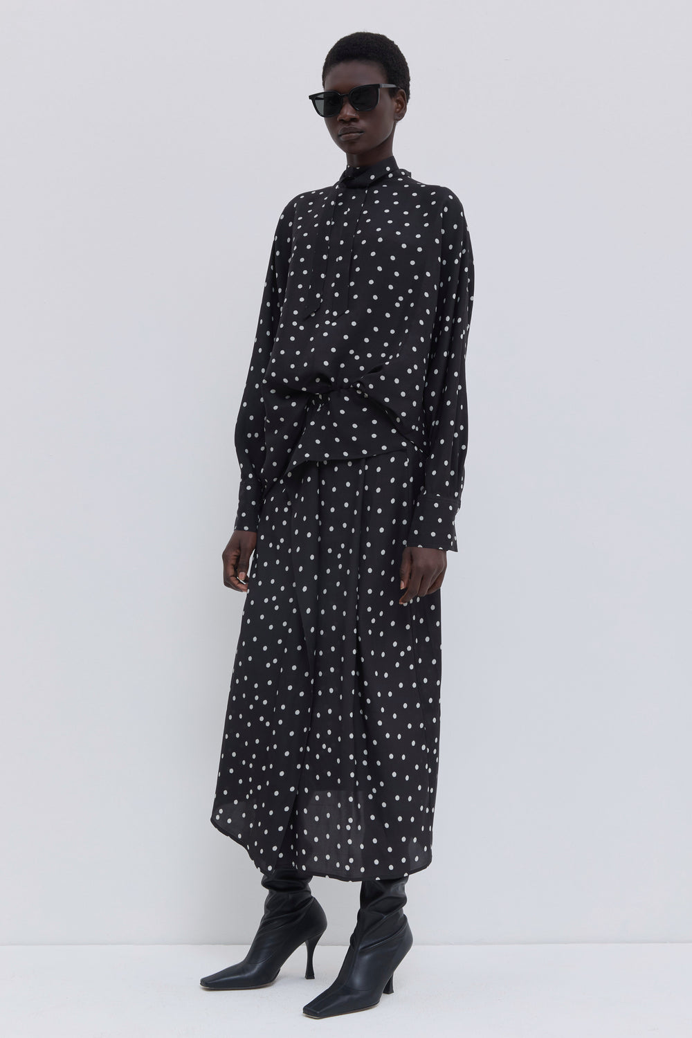 Women’s polka dot batwing sleeve blouse with tie neck