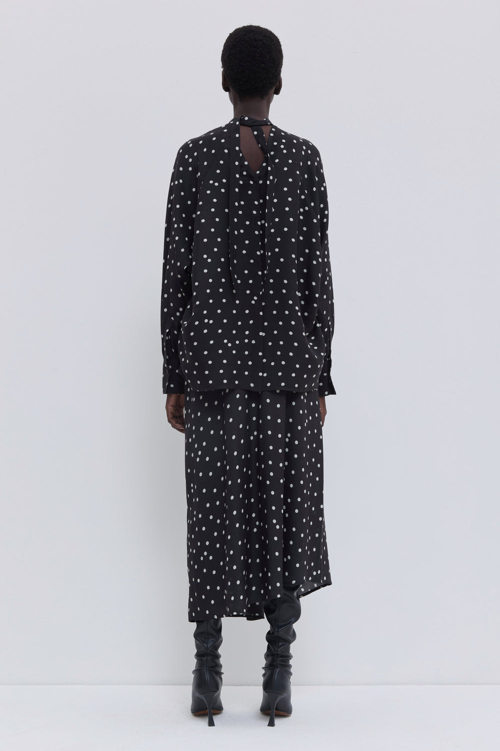 Luxury matte satin top with black and white polka dot print